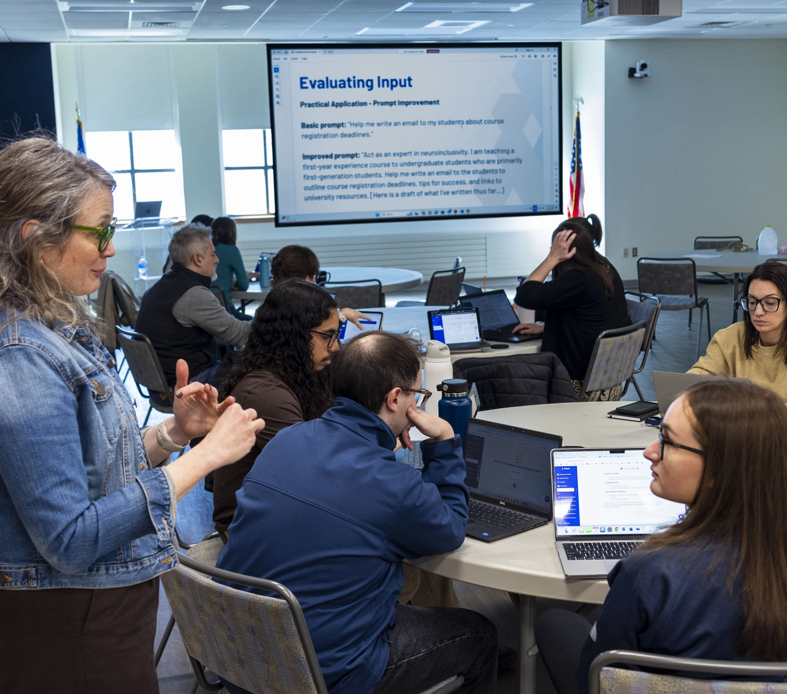 Advisor professional development session. Speaker talking to attendees.